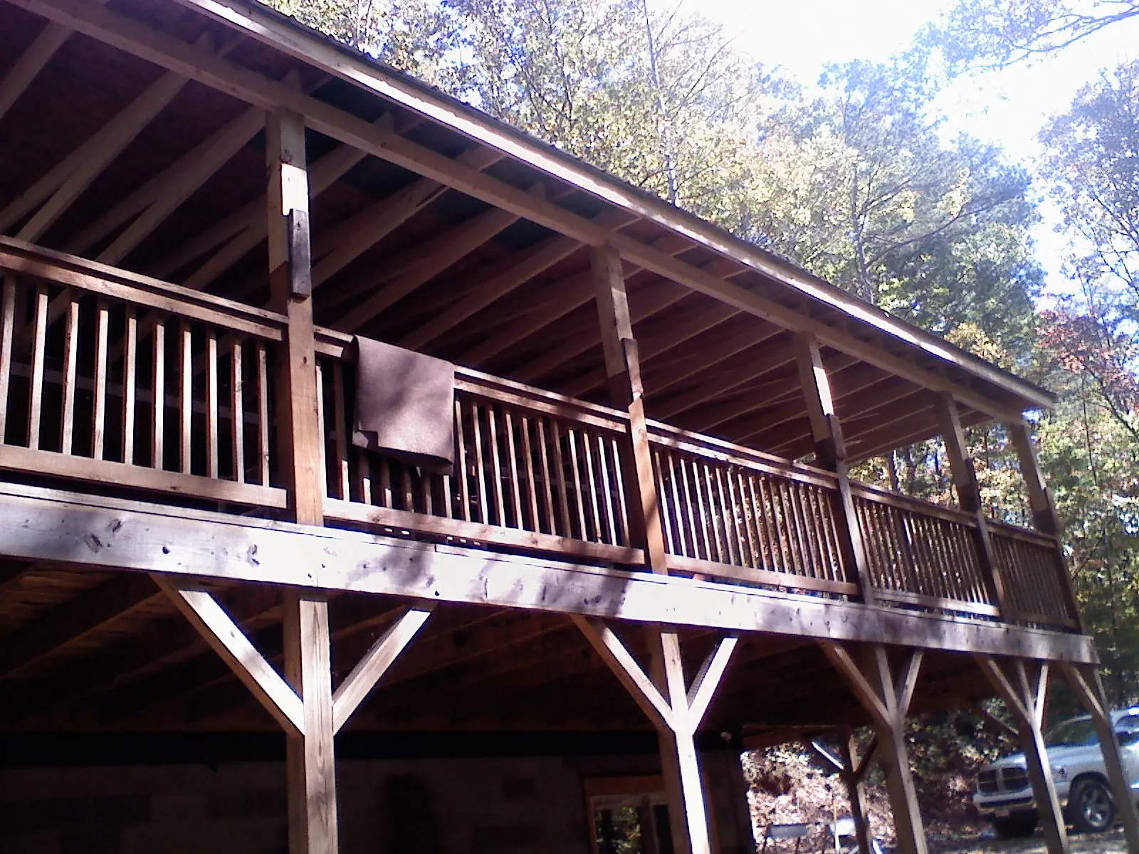 Timber framing under a new elevated porch and deck — Roof Leak Repair in Foxhome by Roofing Brothers
